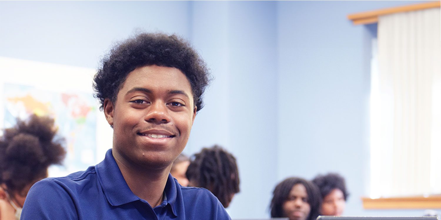 Student smiling in class