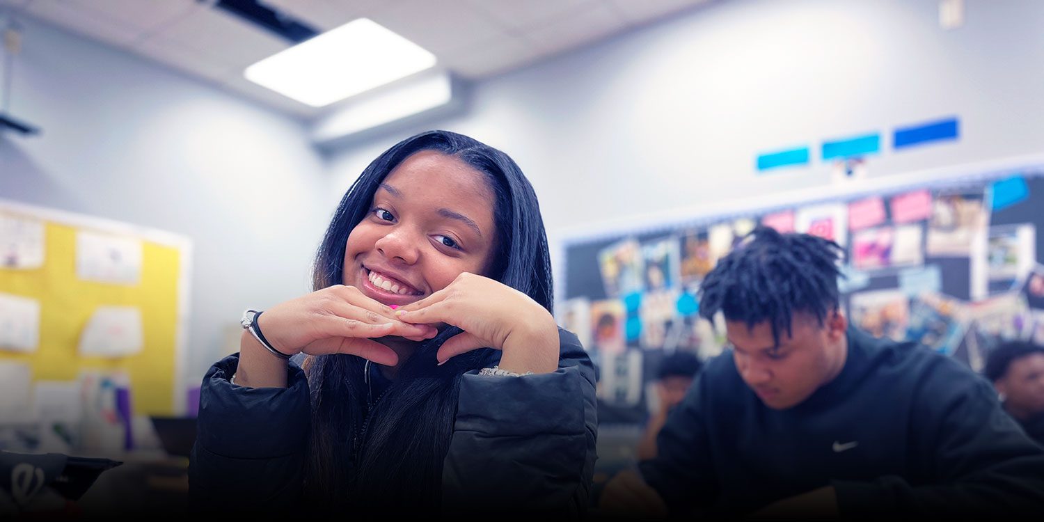 Student smiling in class