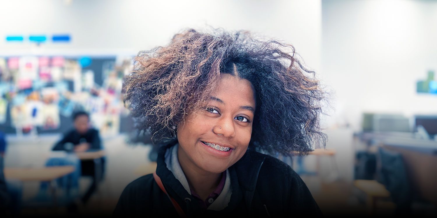 Student smiling in class